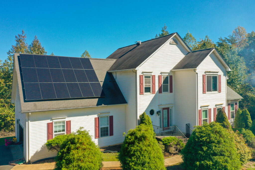 a house with solar panels on the roof